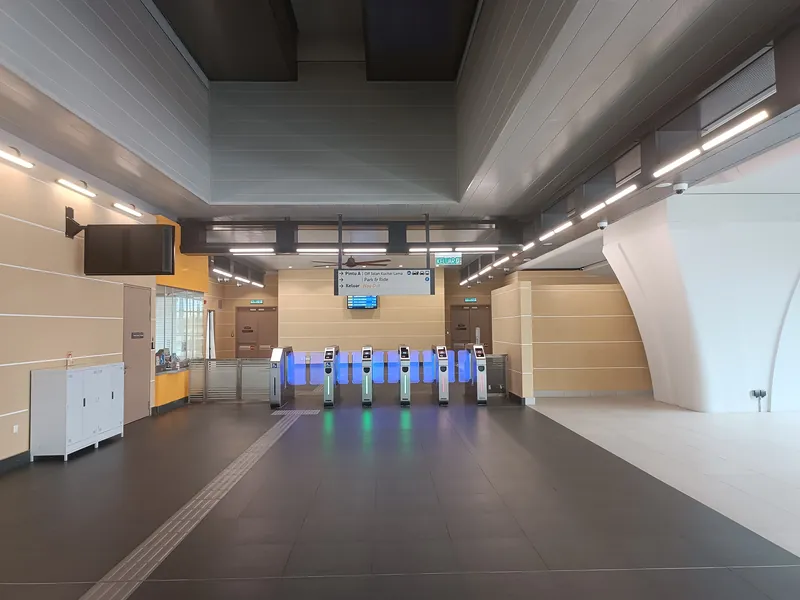 Fare gates in the Kuchai MRT station concourse
